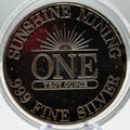 Silver coin with 'Sunshine Mining' branding and specifications on a clear holder.