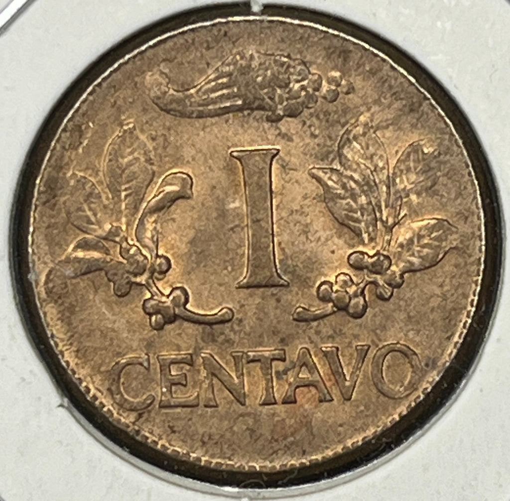 Vintage one centavo coin on a textured surface