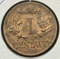 Vintage one centavo coin on a textured surface