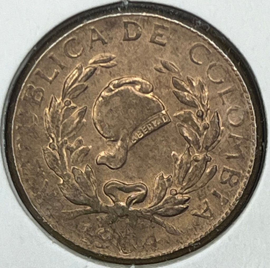 Bronze coin with 'Colombia' text on a white background