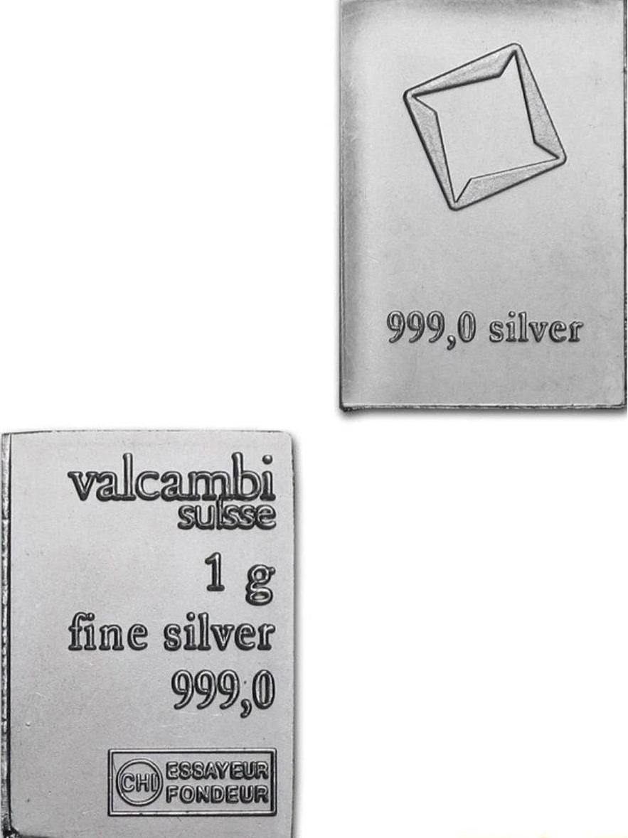 Two silver bars with 'Valcambi Suisse' branding on a white background